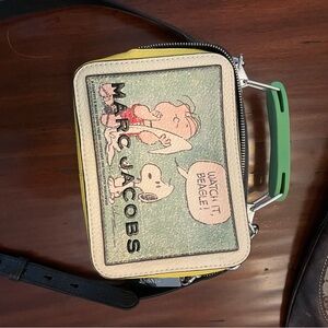 Limited edition Marc Jacobs snoopy purse. Retailed 495. Used a few times